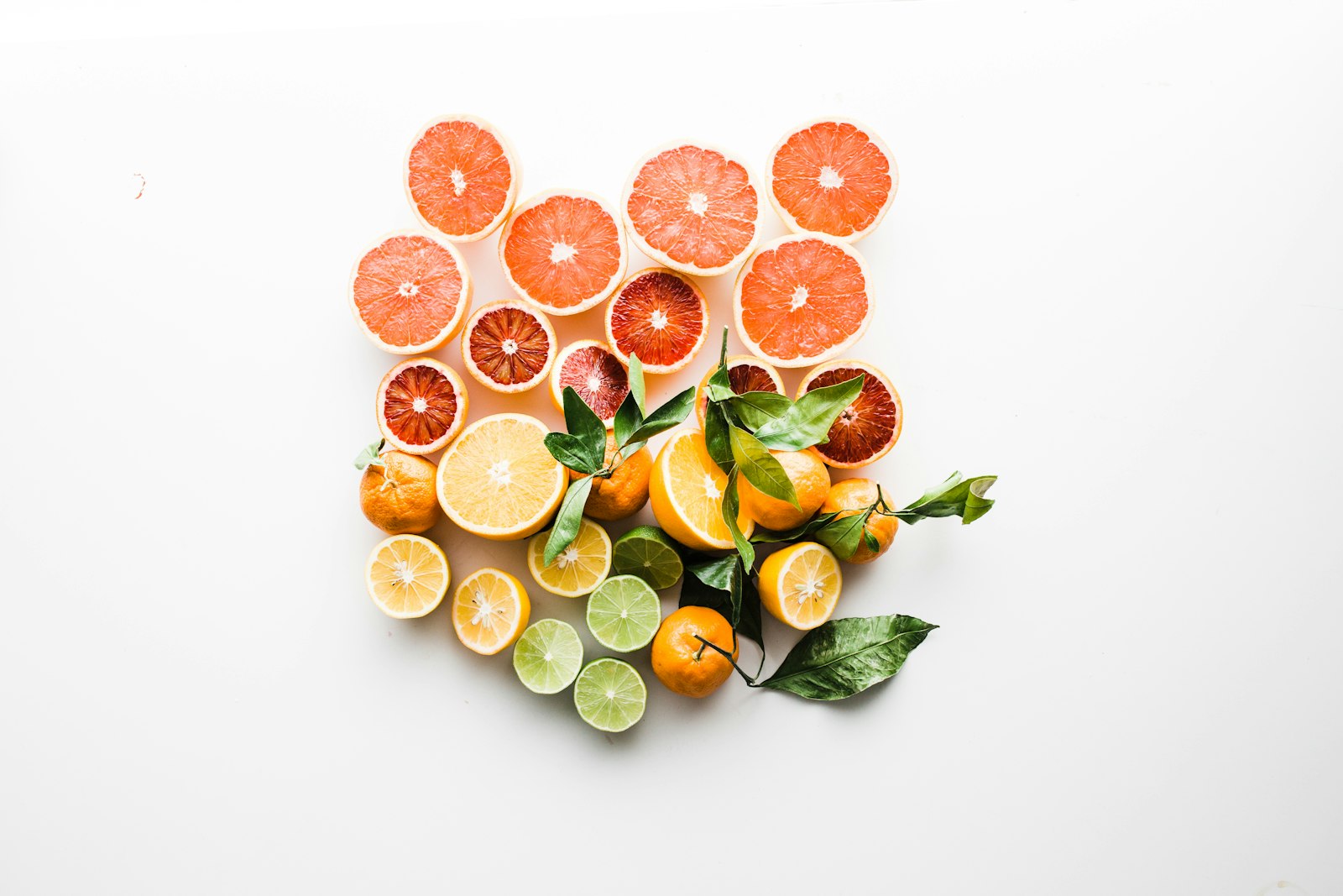 Fresh citrus fruit laid out before pressing