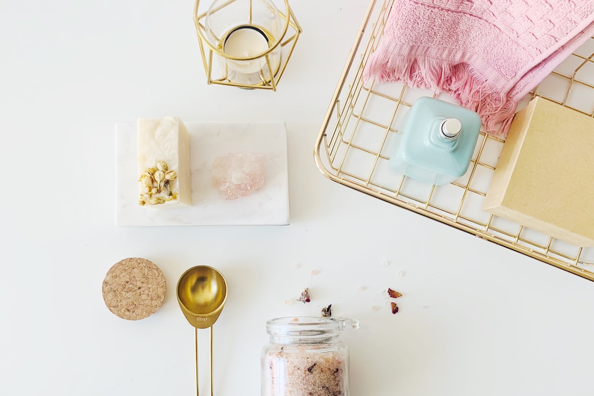 Pastel bath flat lay with towel and soap